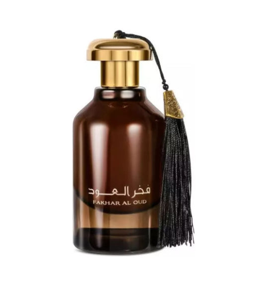 Perfume Fakhari Al Oud de Ard Al Zaafaran en botella marrón con tapa dorada y borla negra